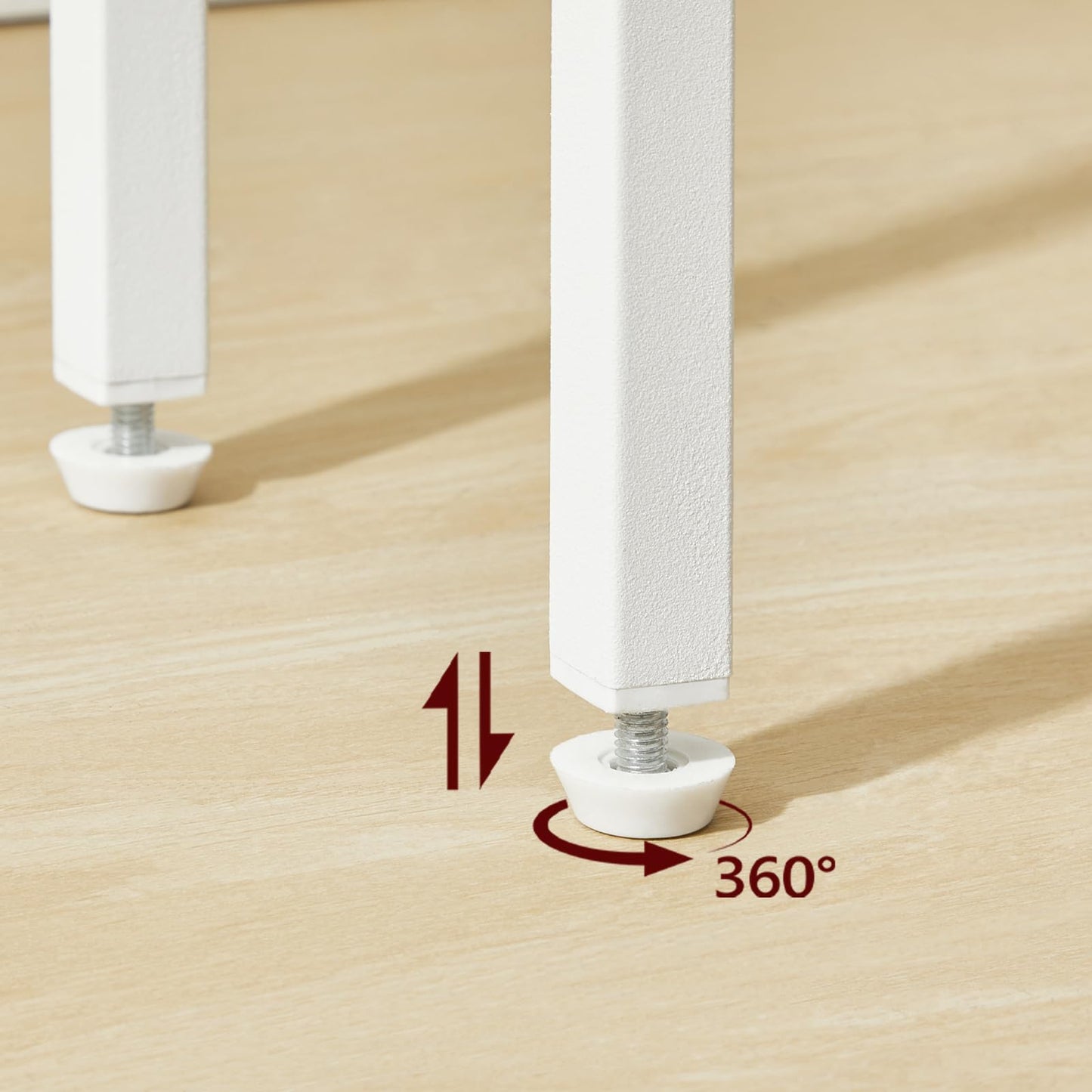 White cabinet leg with a screw on a wooden surface, showing 360-degree rotation.