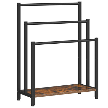 Black metal clothing rack with a wooden shelf on a white background