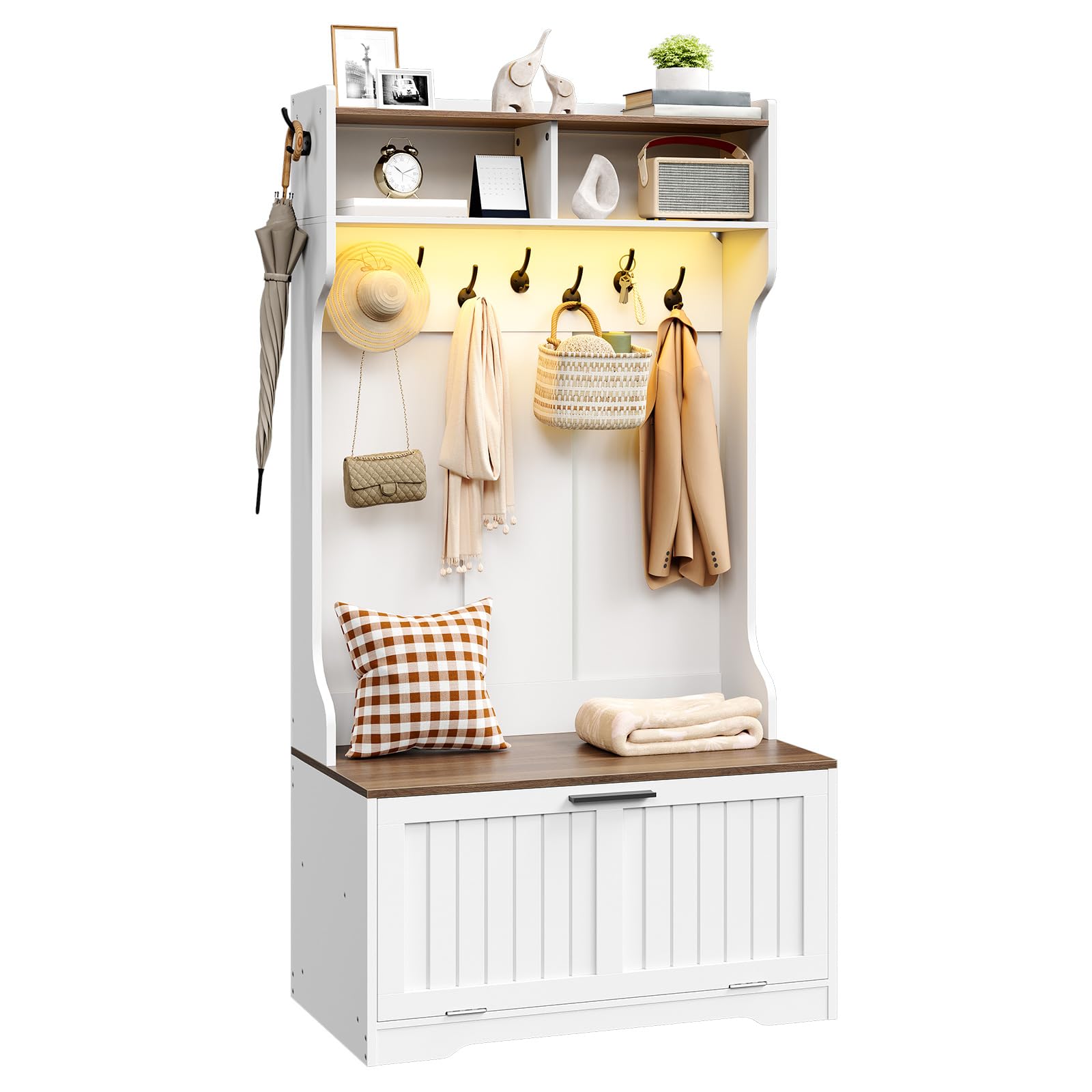 White and wooden entryway cabinet with hooks and storage space on a white background