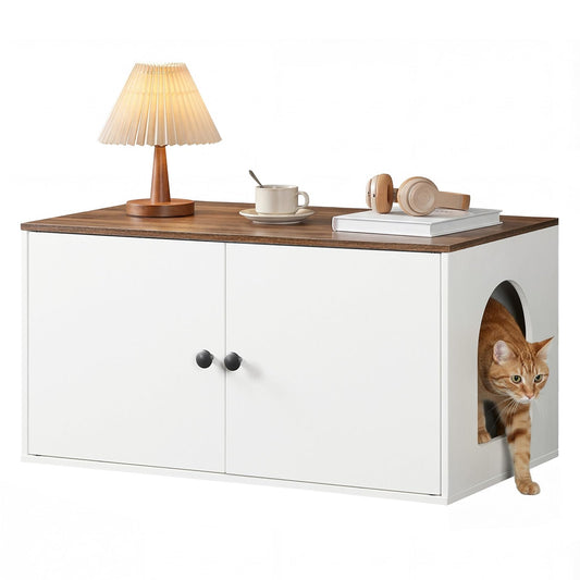 White cabinet with wooden top, lamp, and cat peeking out from a hole.