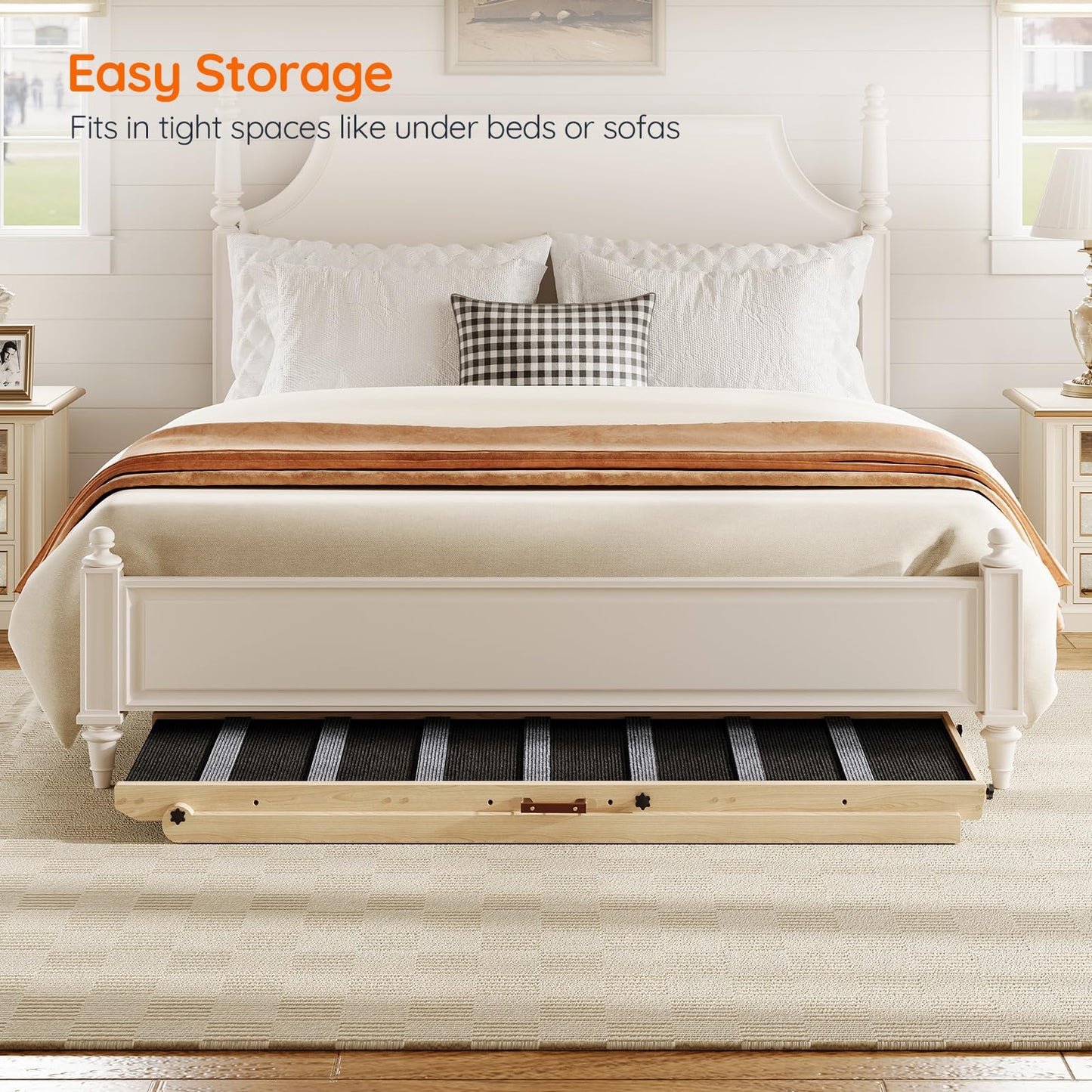White bed with pull-out storage mechanism in a bedroom setting