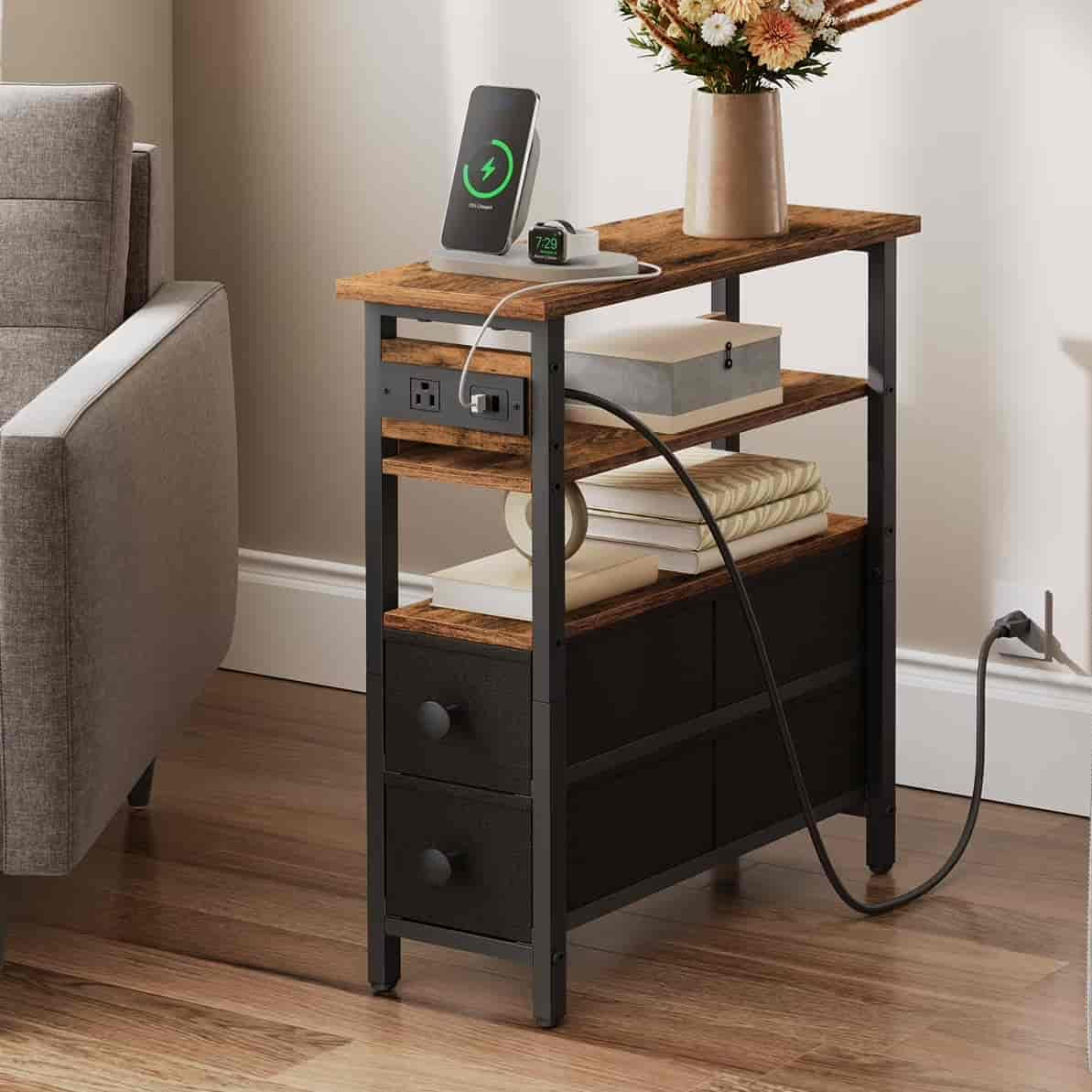 Small wooden side table with charging station in a living room setting