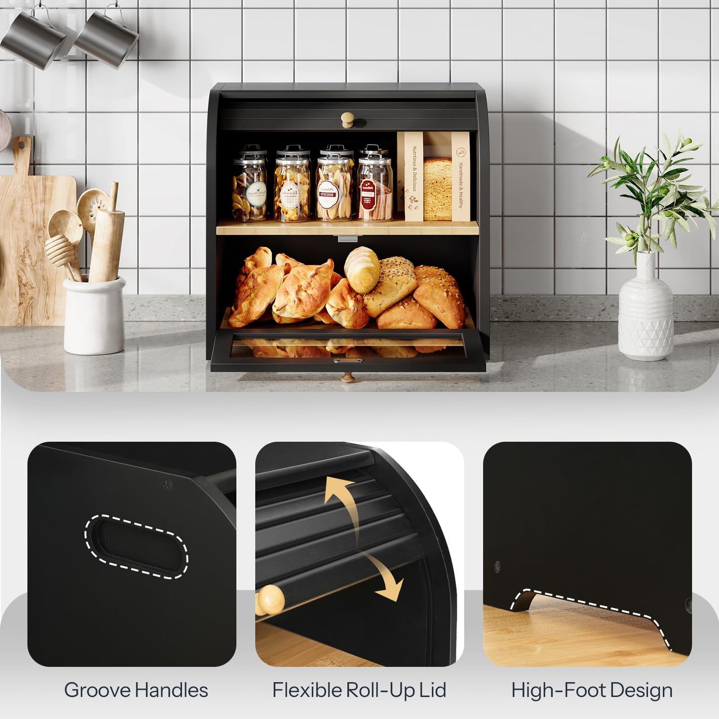 Black bread bin with bread and jars on a kitchen counter, showing details of handle, lid, and foot design.