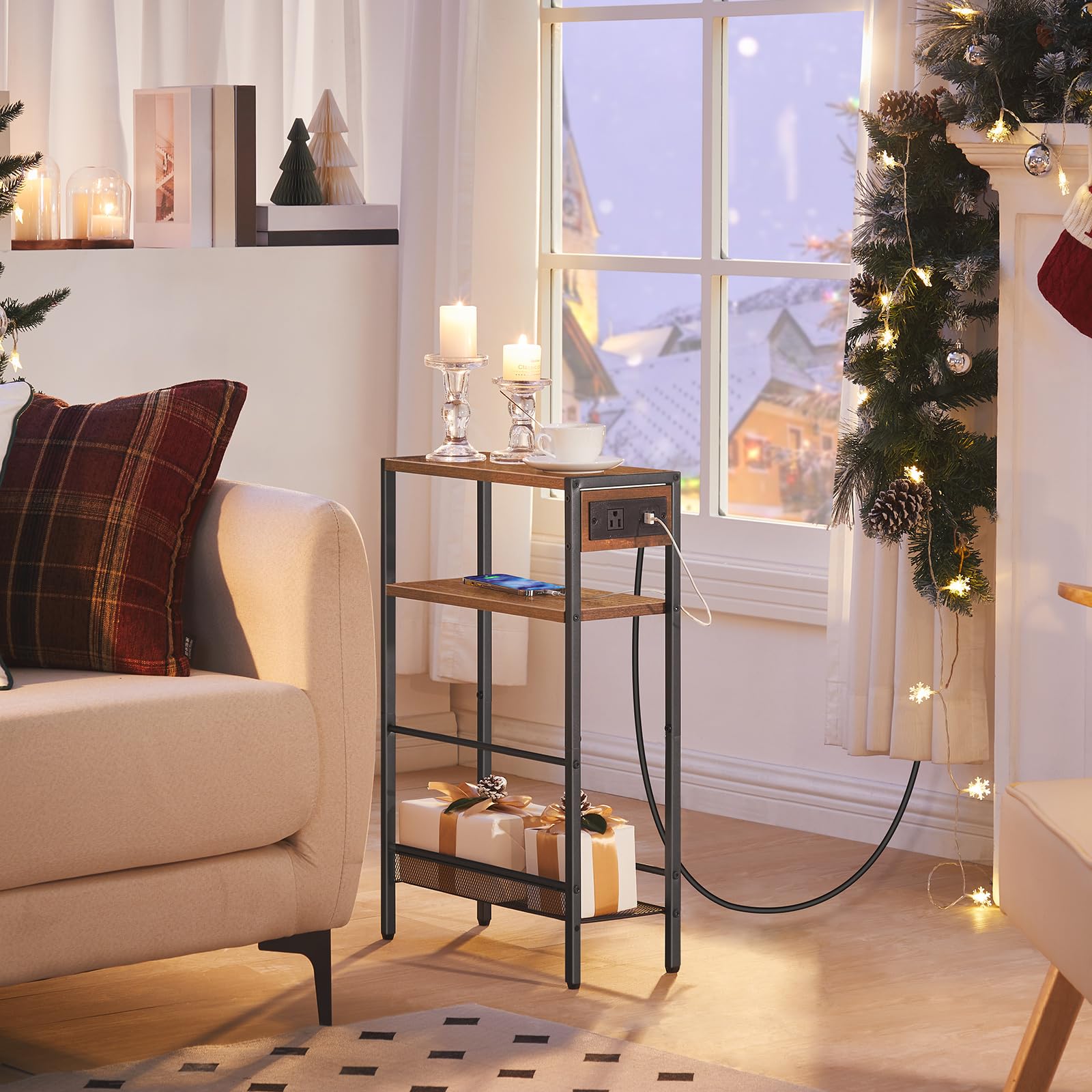 Living room with a beige sofa, side table, and Christmas decorations.