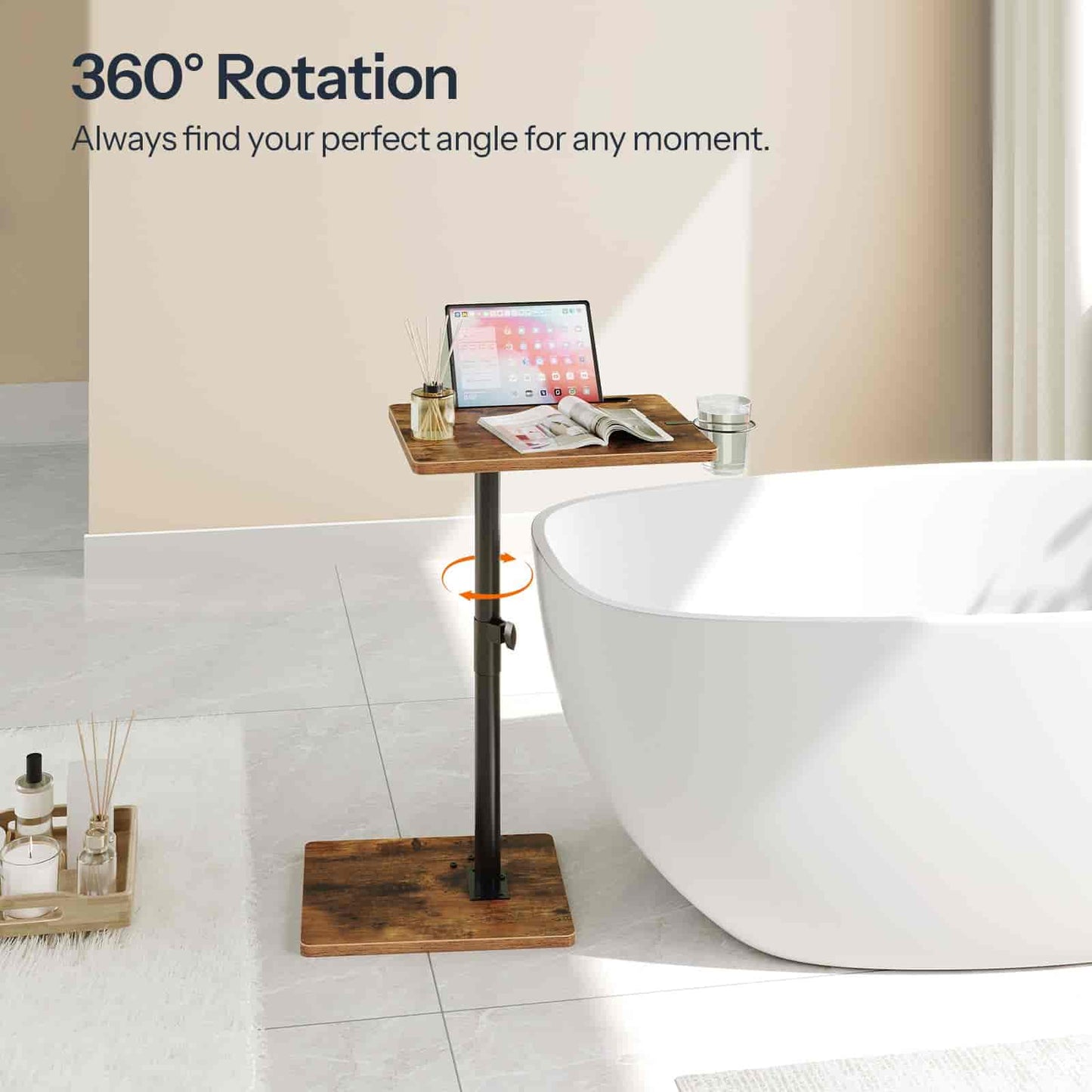 Wooden adjustable stand with a laptop and newspaper next to a white bathtub, with '360° Rotation' text above.