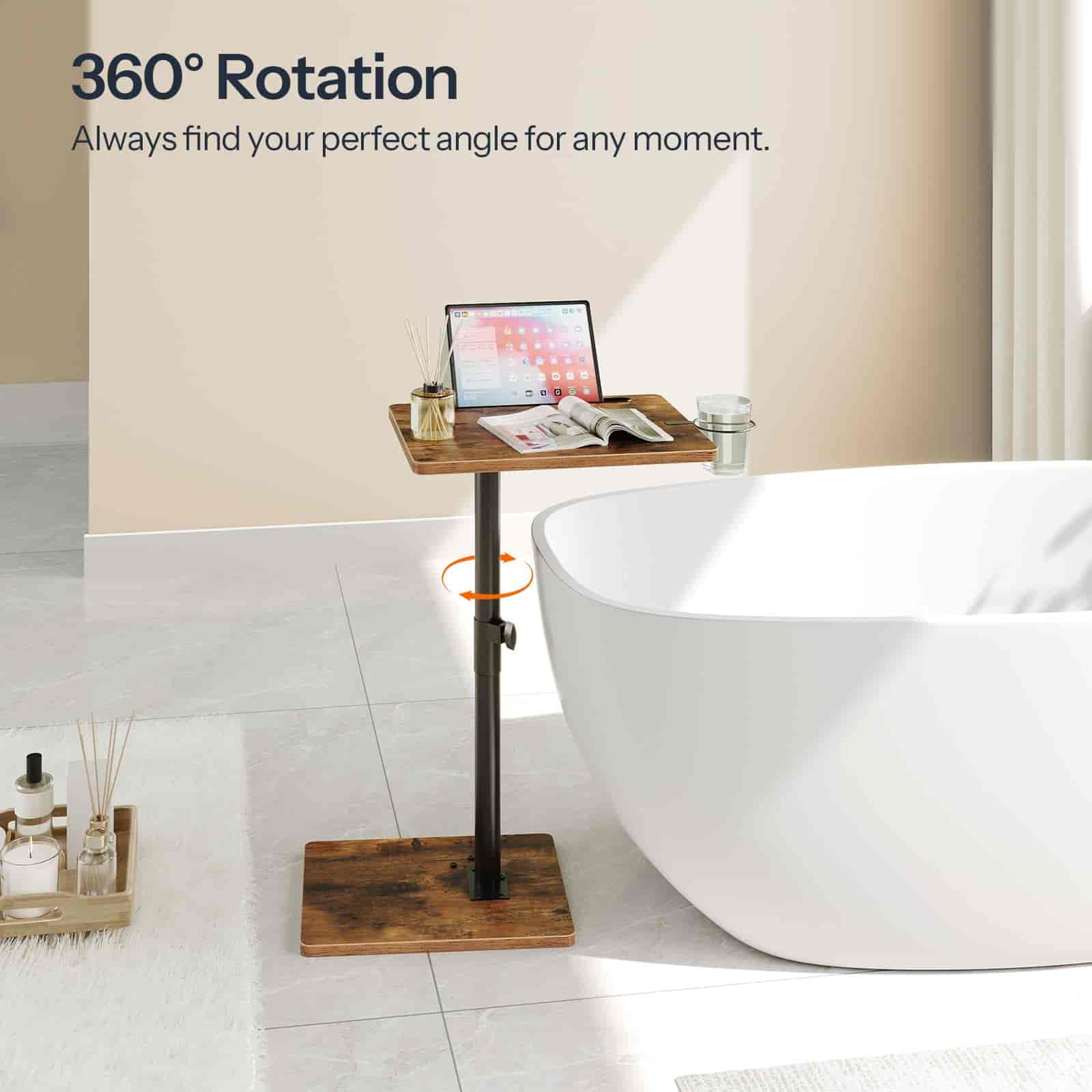 Wooden adjustable stand with a laptop and newspaper next to a white bathtub, with '360° Rotation' text above.