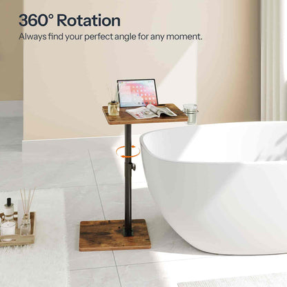 Wooden adjustable stand with a laptop and newspaper next to a white bathtub, with '360° Rotation' text above.