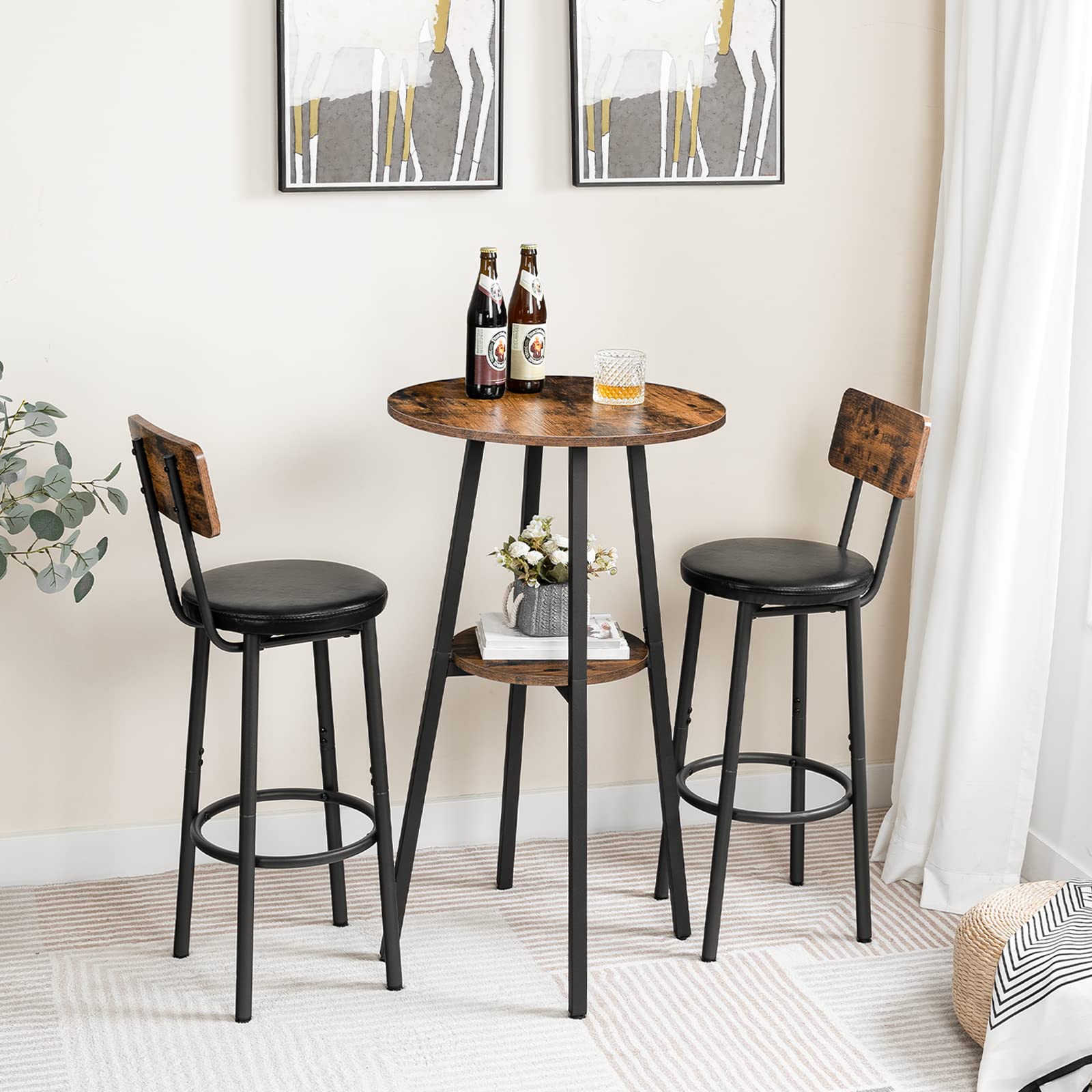 Bistro table with two bar stools in a room setting.