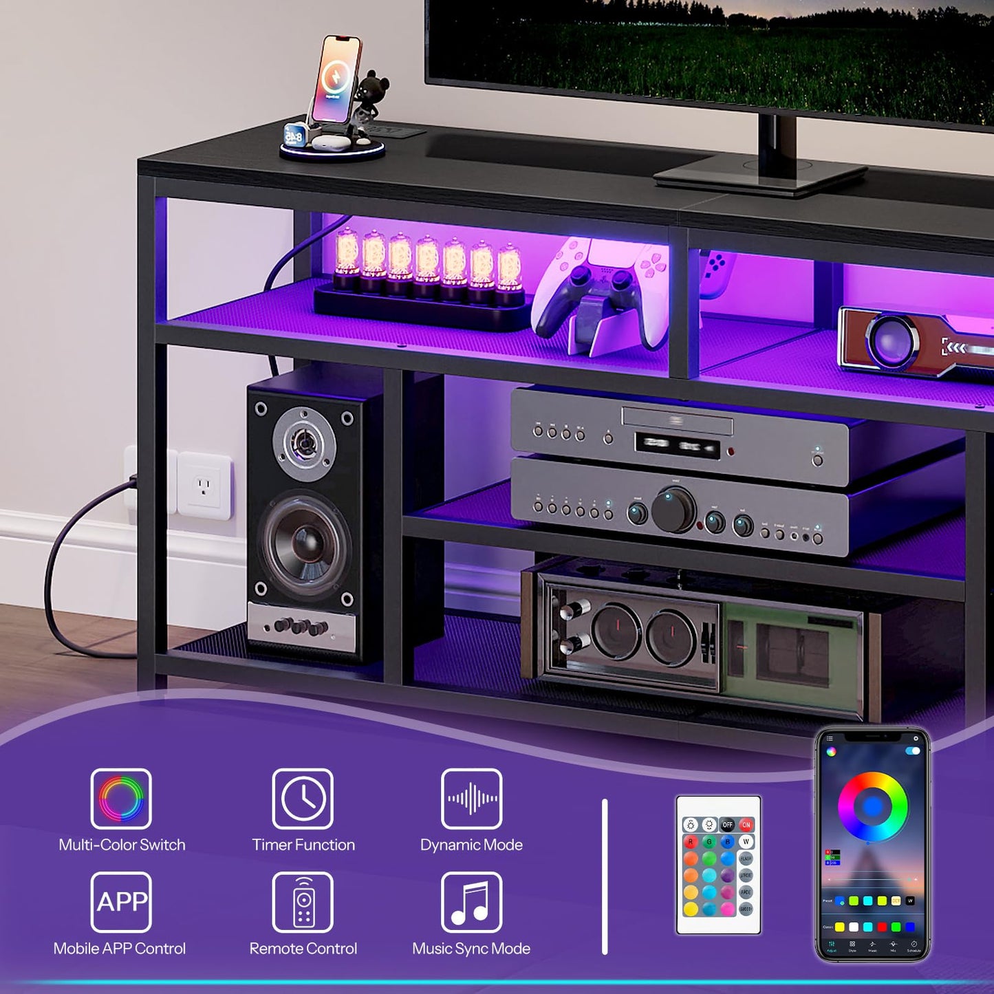 Black entertainment console with LED lighting, speakers, and electronic devices.