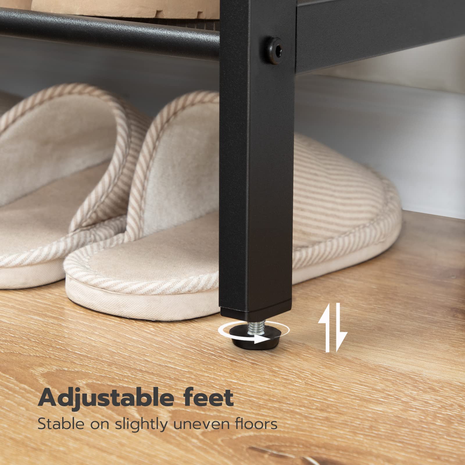 Adjustable feet of a piece of furniture on a wooden floor with slippers in the background.
