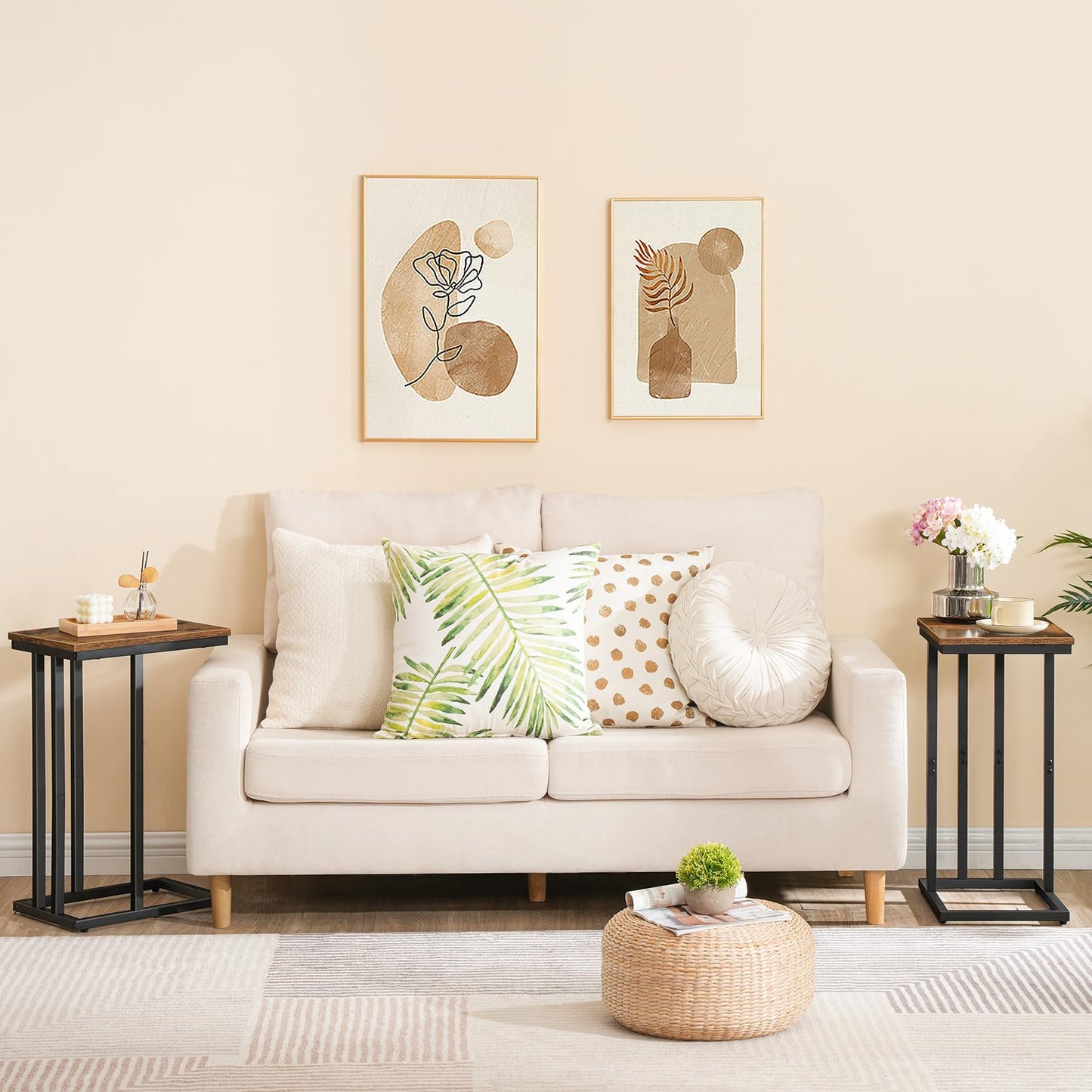 Living room with a beige sofa, decorative pillows, and wall art.