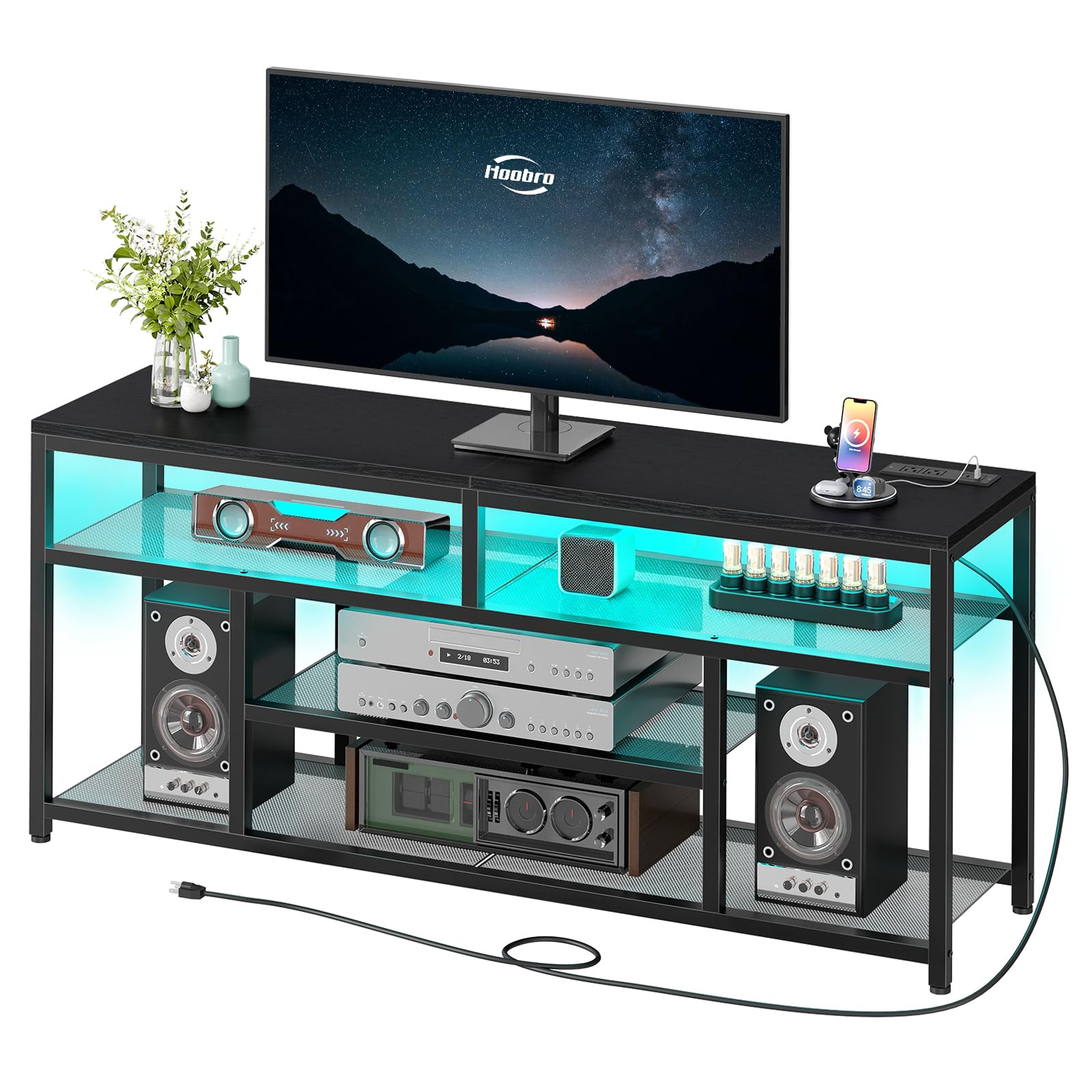 TV stand with a television, speakers, and decorative items on a white background