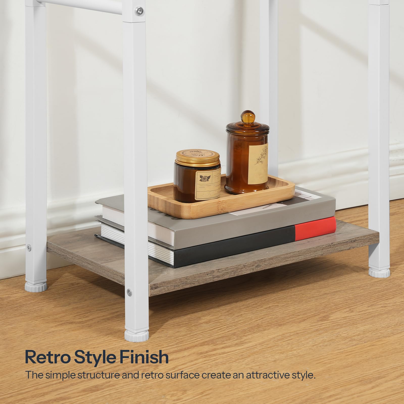 Retro-style shelf with books and candles on a wooden floor.