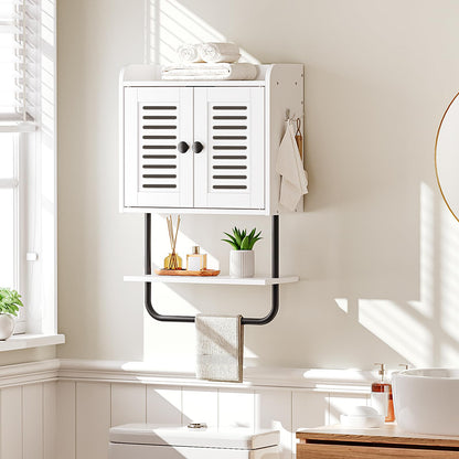 White wall-mounted cabinet with a shelf in a bathroom setting
