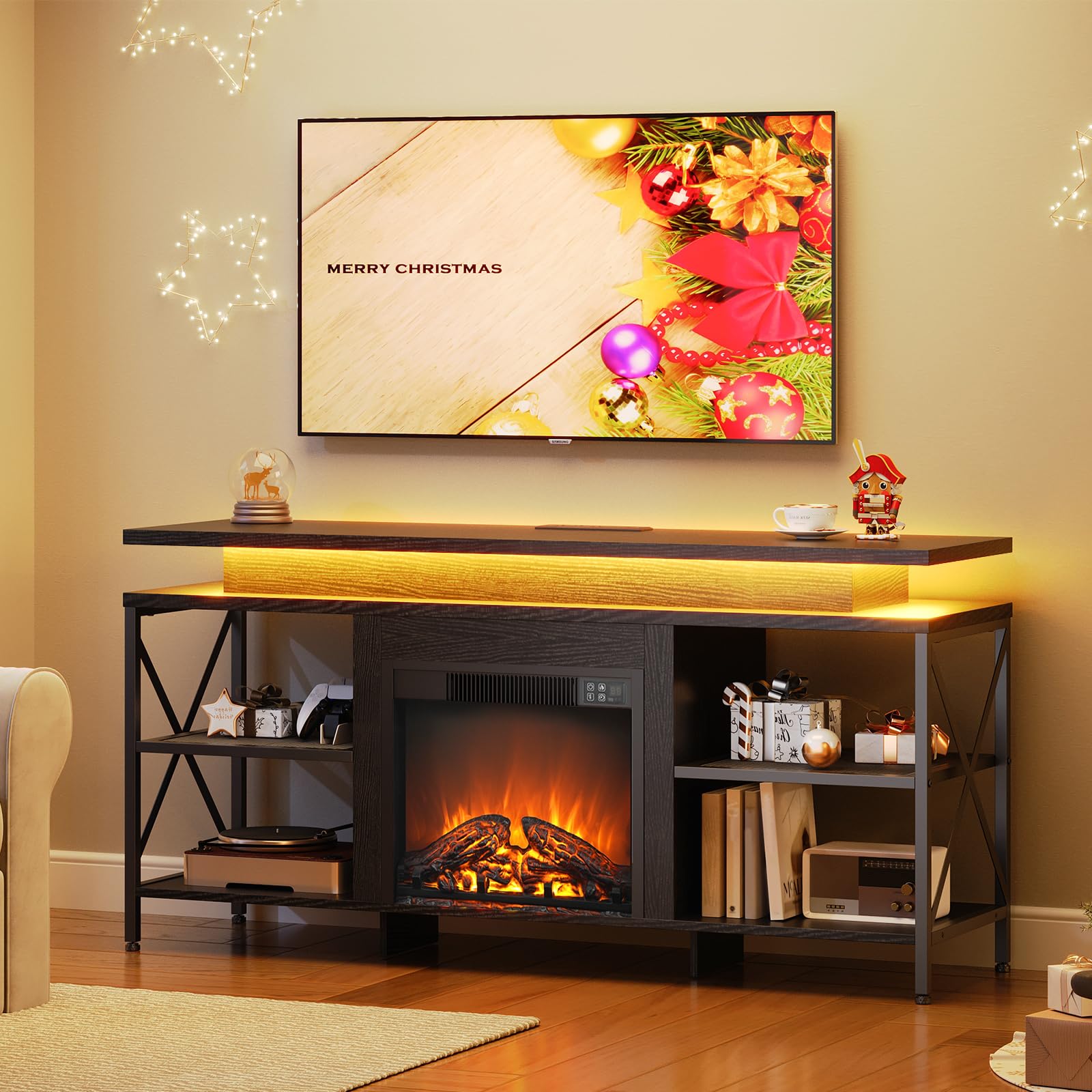 Living room with a TV displaying a Christmas-themed screen, a fireplace, and decorative items.
