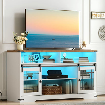 Modern entertainment console with a television displaying an ocean scene, surrounded by decorative items.
