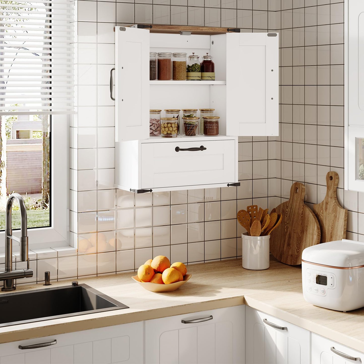 Modern kitchen with white cabinets, tiled walls, and a window.