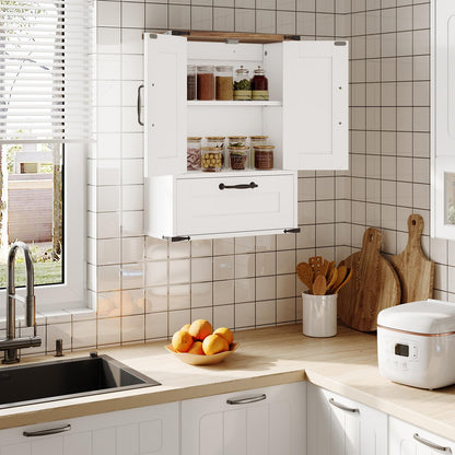 Modern kitchen with white cabinets, tiled walls, and a window.
