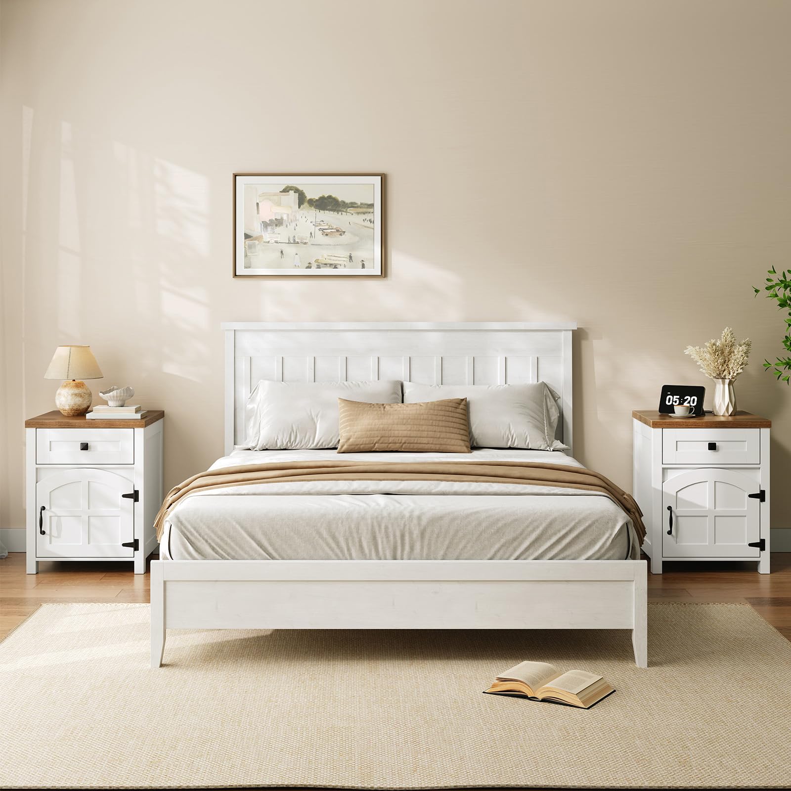 White bedroom with a bed, nightstands, and decor items.