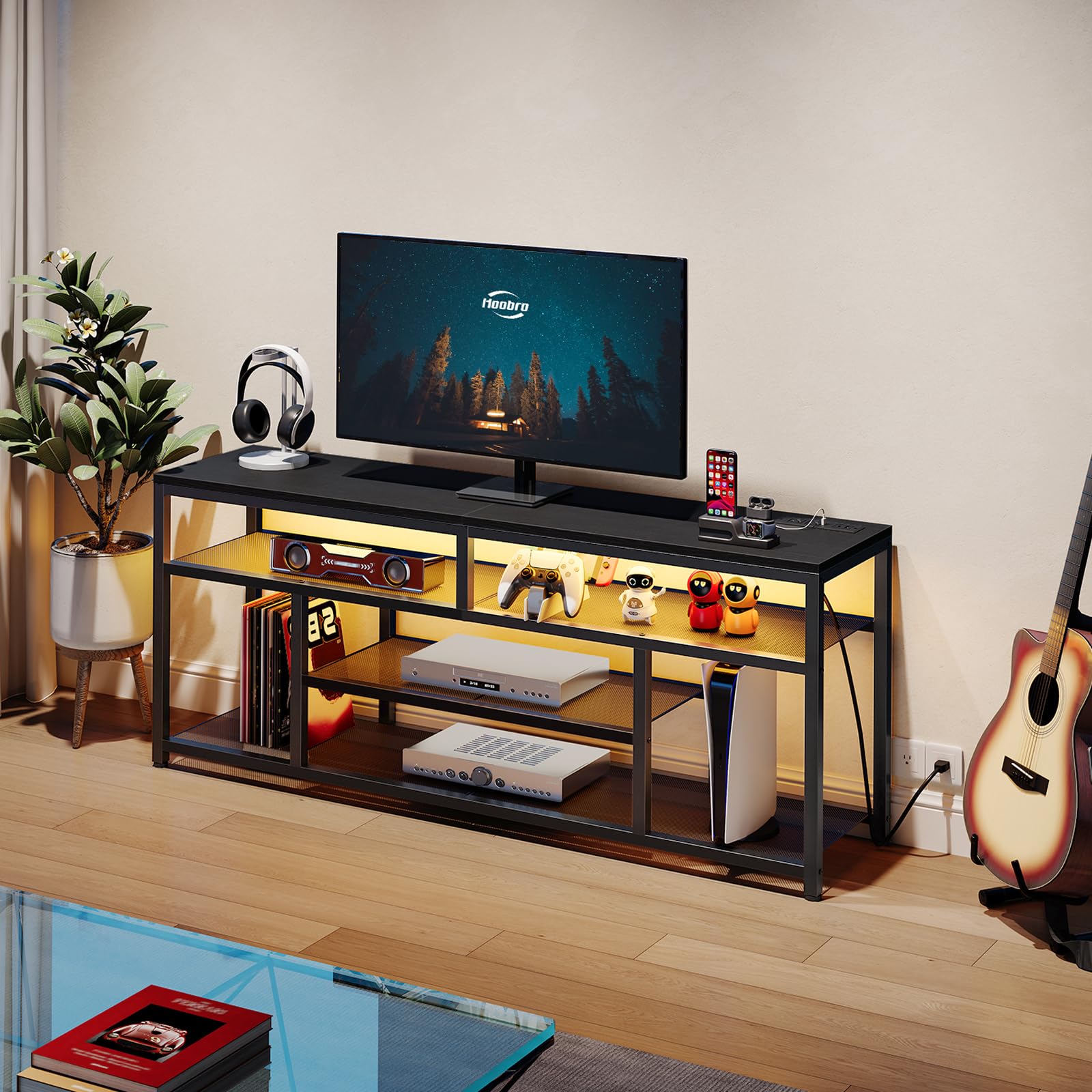 Modern TV stand with electronic devices in a living room setting