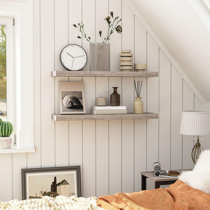 Nestled bedroom with wooden shelves, decor items, and a lamp.