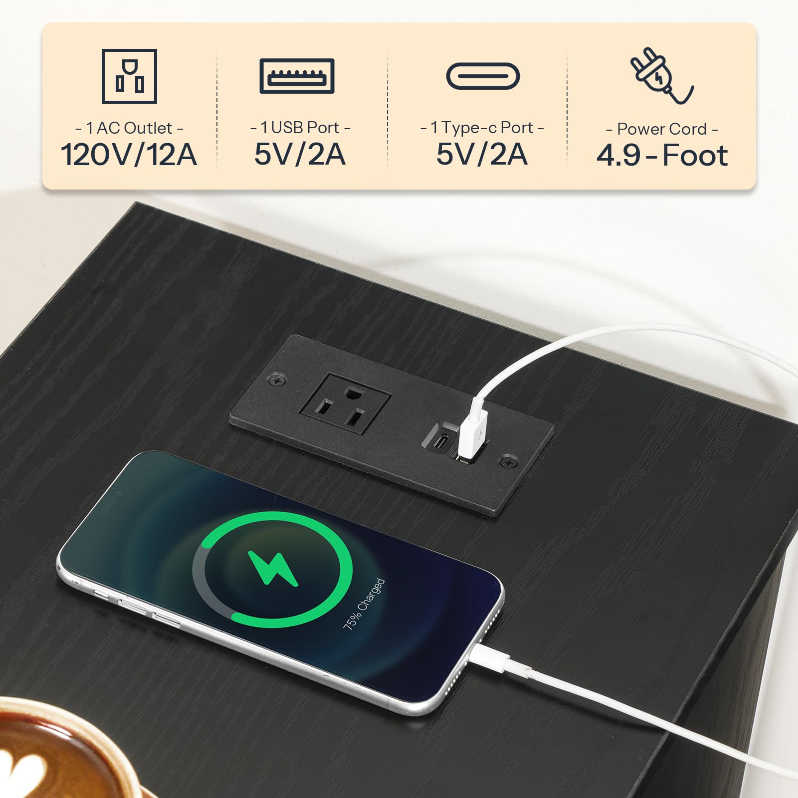 Smartphone charging on a desk with power outlet and ports labeled above.