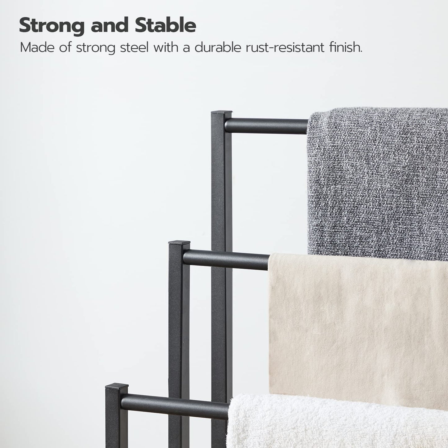 Towel rack with towels on a white background, emphasizing strength and stability.