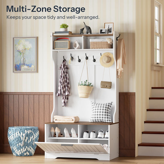 White multi-zone storage unit with shelves, hooks, and shoe storage in a home setting.