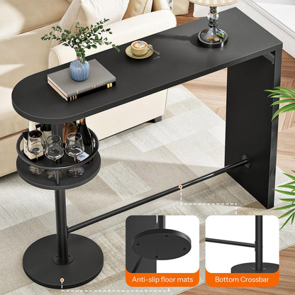 Black side table with a lower shelf in a living room setting