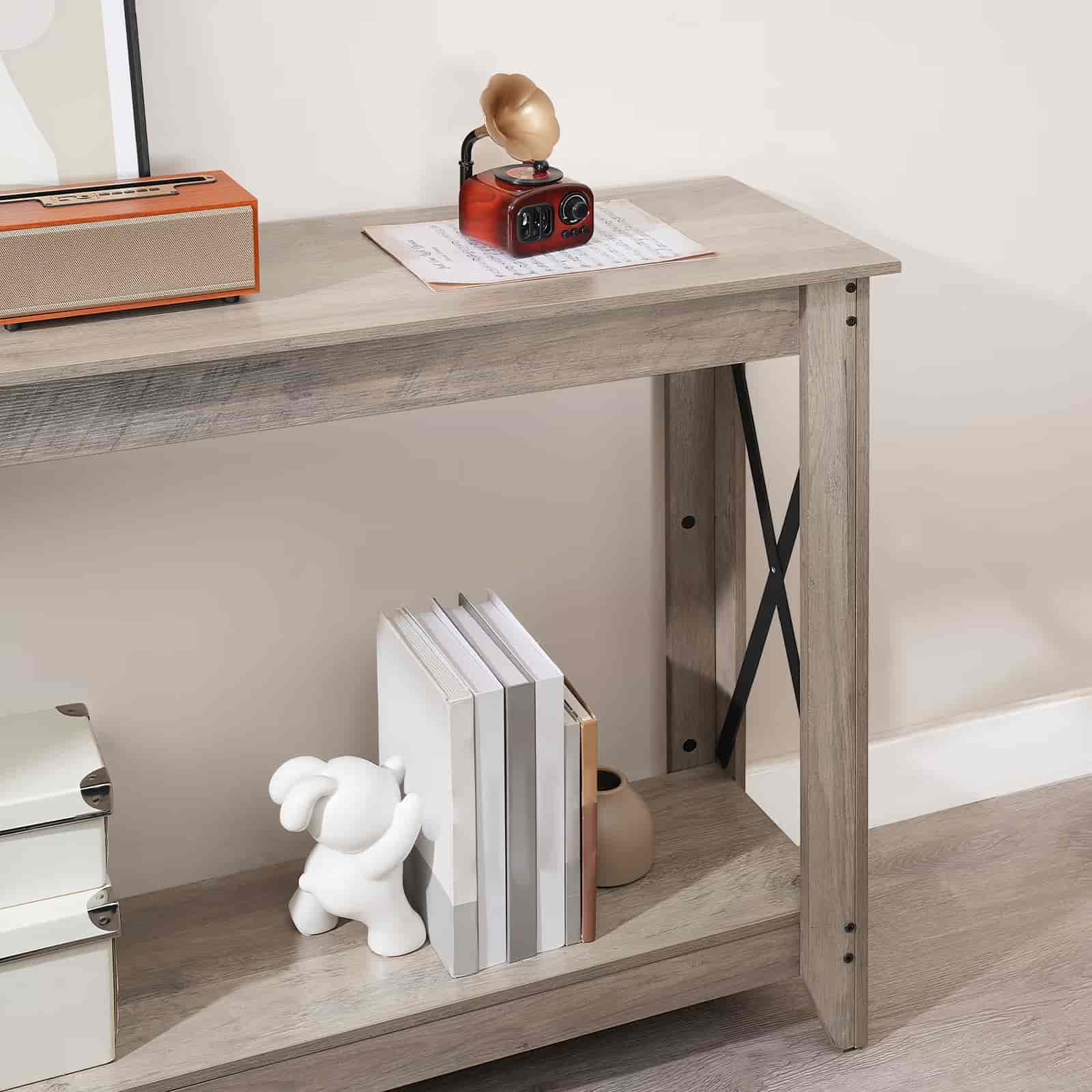 Wooden console table with decorative items on a neutral background