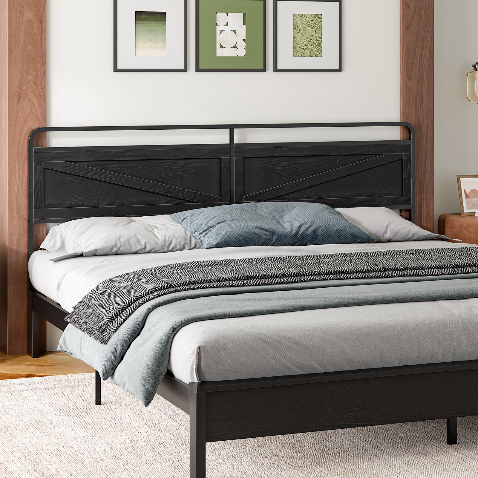 Bedroom with a black metal bed frame, white bedding, and decorative pillows.