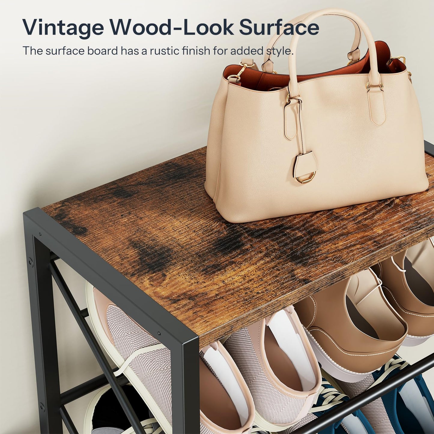 Beige handbag on a wooden surface with shoes below, on a rustic wooden shelf.
