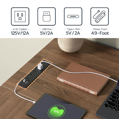 Power strip with multiple outlets and ports on a wooden desk