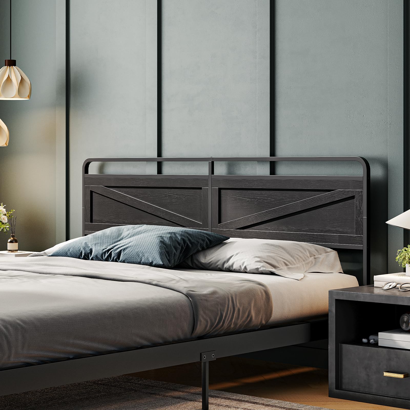 Bedroom with a dark wooden bed frame and matching nightstand against a gray wall.