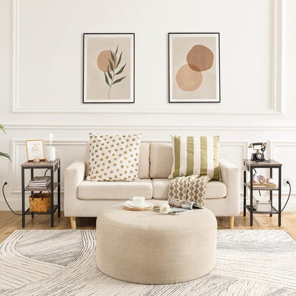 Living room with a beige sofa, ottoman, and decorative pillows.