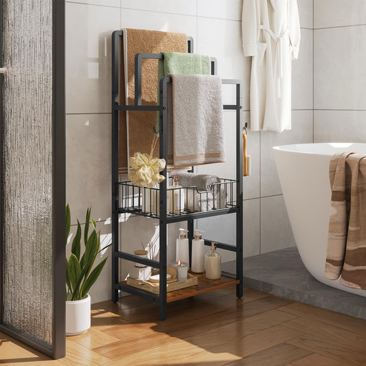 Bathroom with a black metal shelf holding towels and toiletries, next to a bathtub.