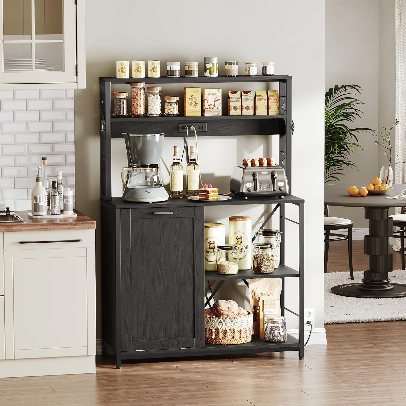 Black kitchen storage shelf with various items in a kitchen setting
