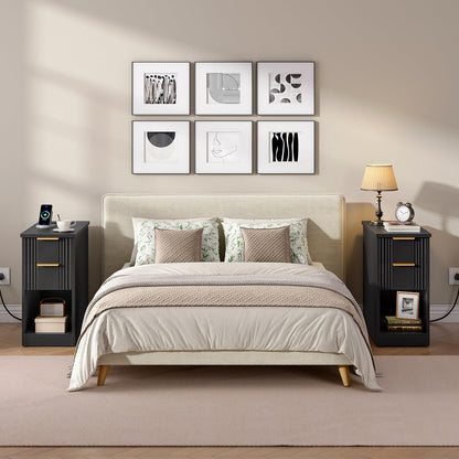 Neatly made bed in a bedroom with decorative pillows and wall art.