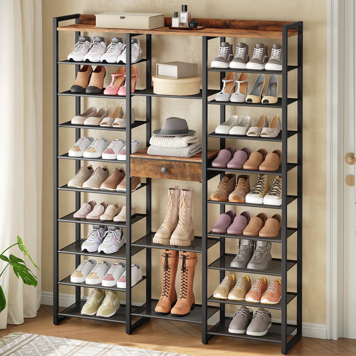 Multi-tiered shoe rack with various shoes on shelves in a room setting.
