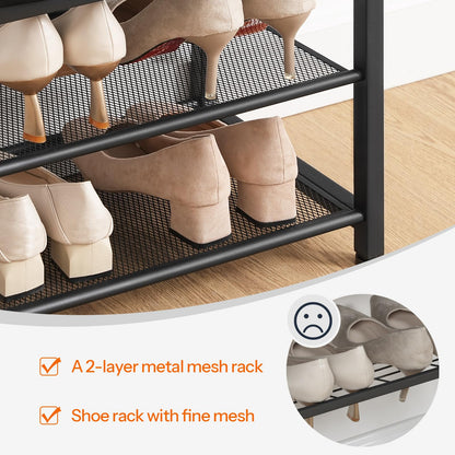 Shoe rack with metal mesh shelves holding beige shoes on a wooden floor.