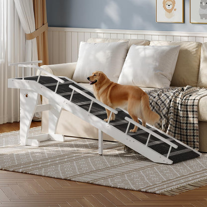 Dog using a white pet ramp in a living room setting.