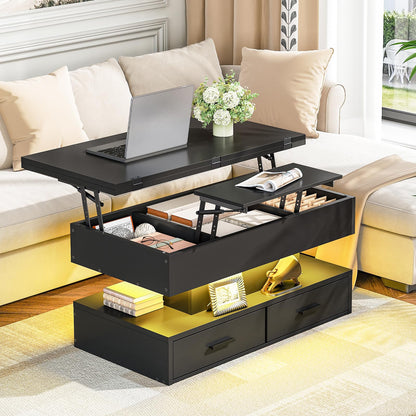Black lift-top coffee table with laptop, flowers, and books in a living room setting.