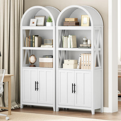 White bookshelves with arched top and cabinet doors in a room setting.