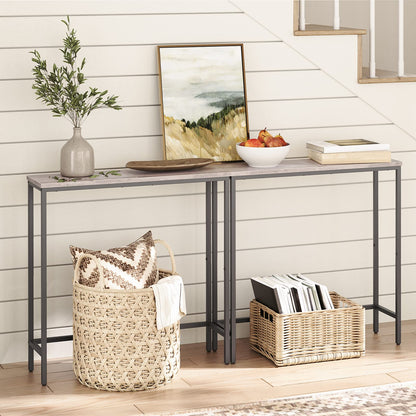 Console table with decorative items against a white wall