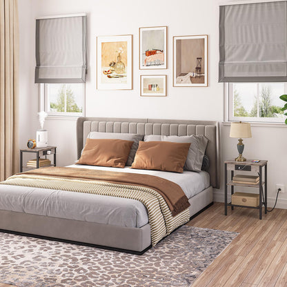 Neatly arranged bedroom with a bed, side tables, and wall art.