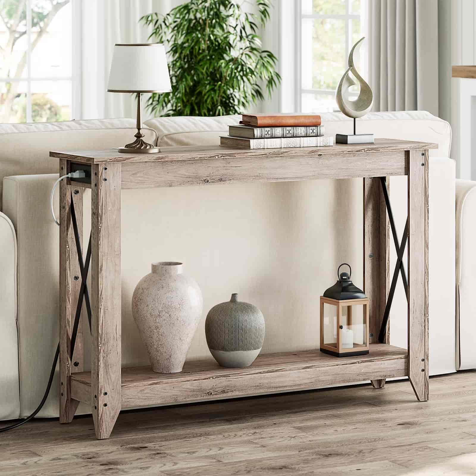 Wooden console table with decorative items in a living room setting