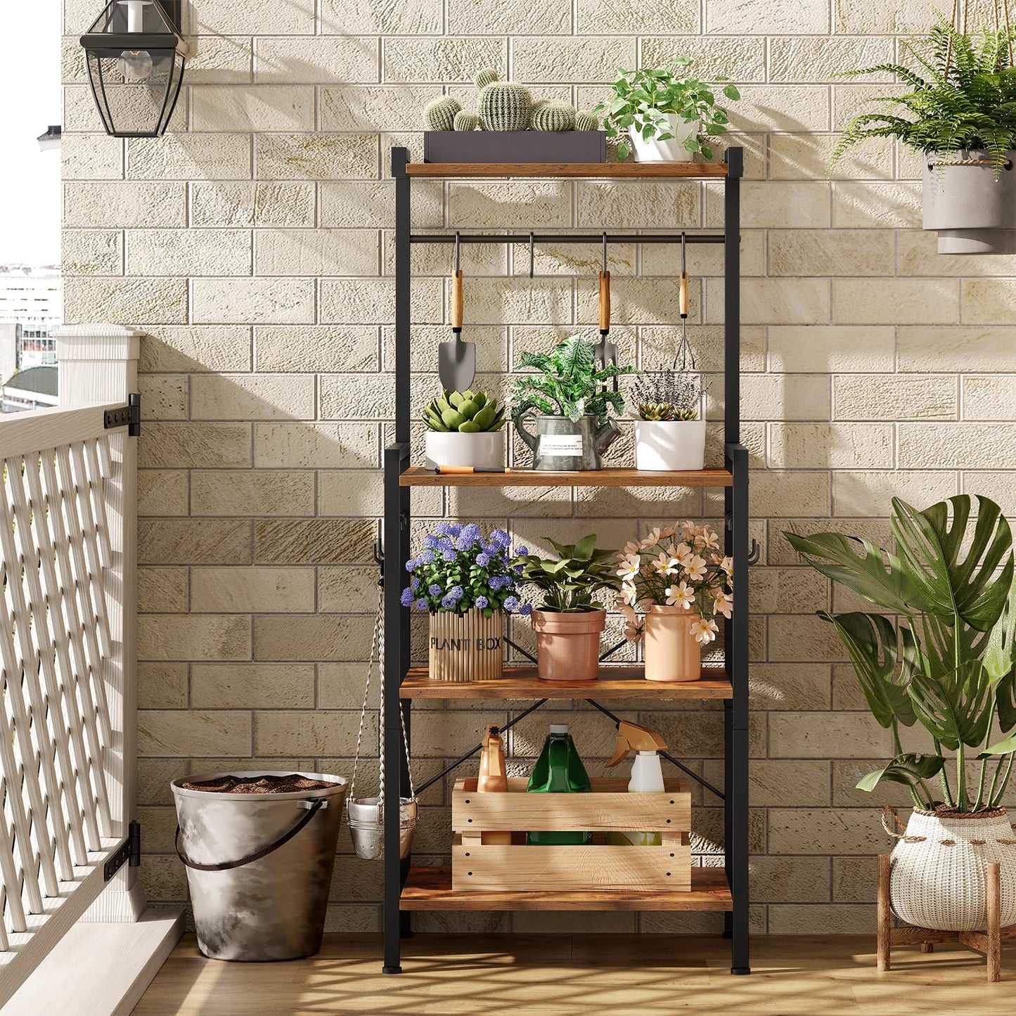 Wooden shelf with plants and gardening tools against a stone wall.