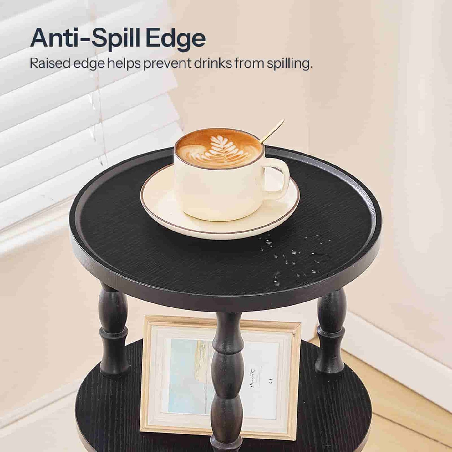 Small round table with anti-spill edge feature, displaying a cup of coffee.