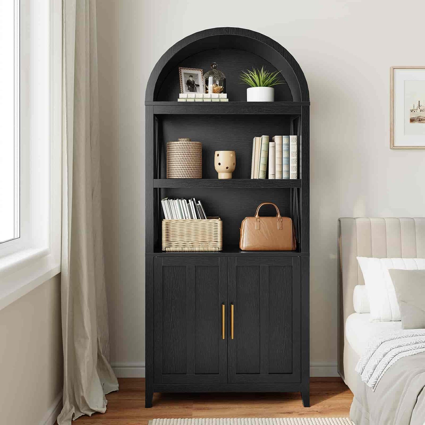 Black arched bookshelf with decorative items in a bedroom setting