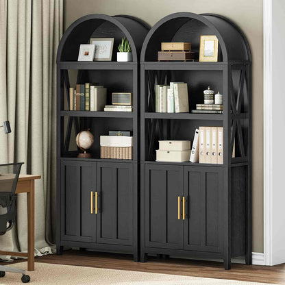 Pair of dark wooden bookshelves with decorative items in a room setting.